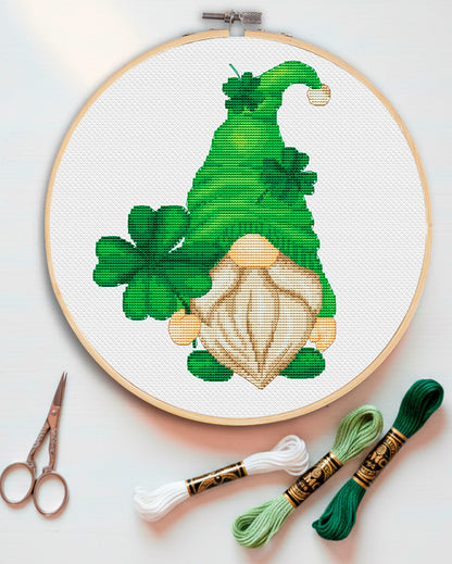 Cross stitch pattern of a Lucky Gnome with a four-leaf clover. St. Patrick's Day gnome embroidery design. Digital PDF pattern for good luck decor.