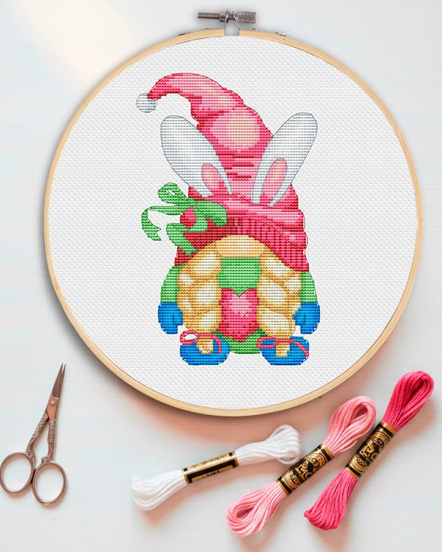Cross stitch pattern of a spring Easter gnome.
