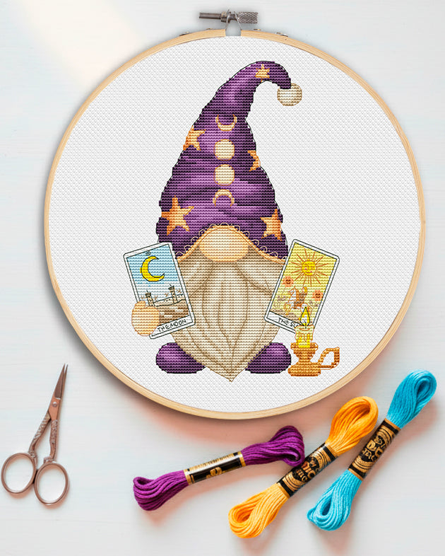Tarot Gnome cross stitch pattern PDF. Mystic gnome character holding tarot cards or crystal ball. Witchy embroidery design for magic lovers.