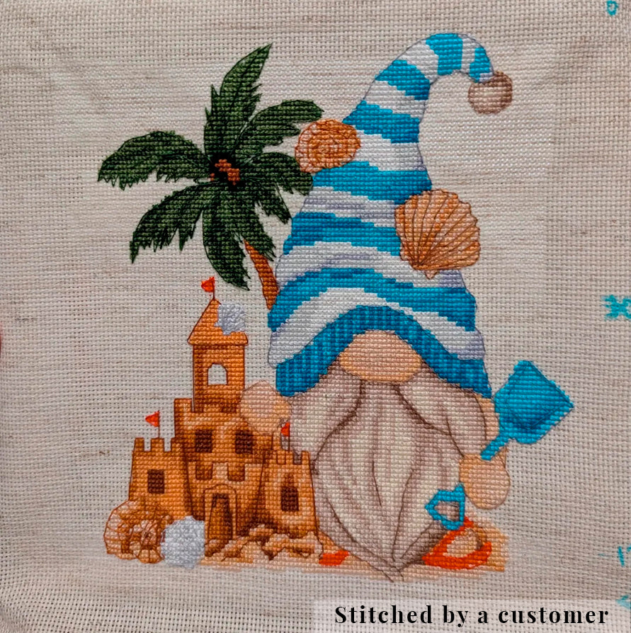Preview beach gnome cross stitch pattern PDF.