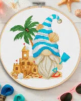 Cross stitch pattern of a Beach Gnome with a surfboard and sun hat. Summer-themed gnome embroidery design. Digital PDF pattern for coastal decor.