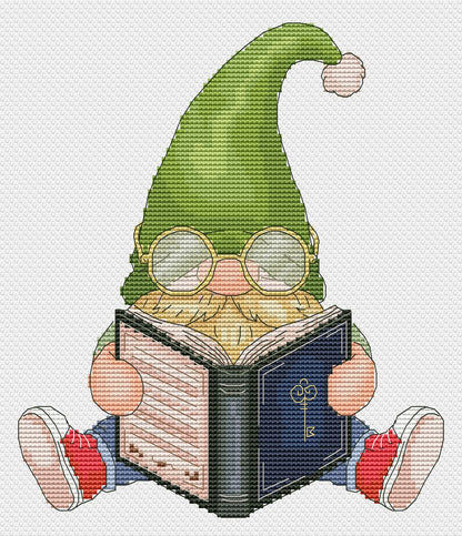 Cross-stitched pattern of a gnome reading a book on a white background