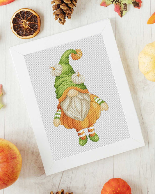 Embroidery pattern of a Gnome with a large pumpkin.